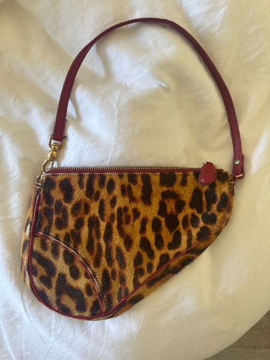 Dior Handbags - Dior Leopard Pony Hair Saddle Bag with Red Trim